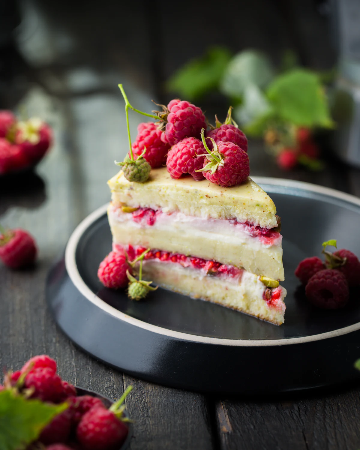 Raspberry ricotta cake slice on a plate